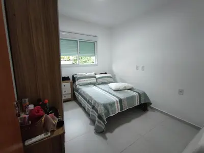Uma cama ou camas num quarto em Casa Praia de Palmas 450m do mar - 0353