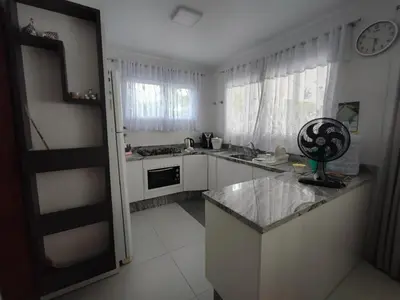 A cozinha ou kitchenette de Casa Praia de Palmas 450m do mar - 0353