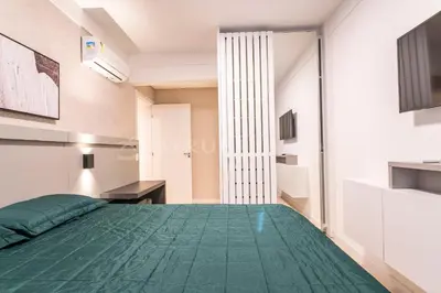 Uma cama ou camas num quarto em Terrazo 407B - Apto 2 quartos em condomínio de luxo à 300 metros da Praia de Bombas