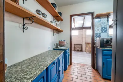A cozinha ou kitchenette de Casa aconchegante perto da praia HN6078