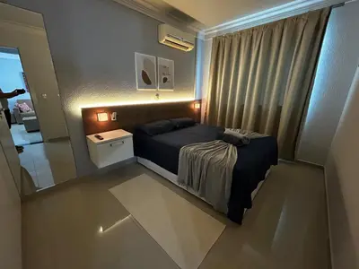 Uma cama ou camas num quarto em Apto em condomínio com lazer completo!