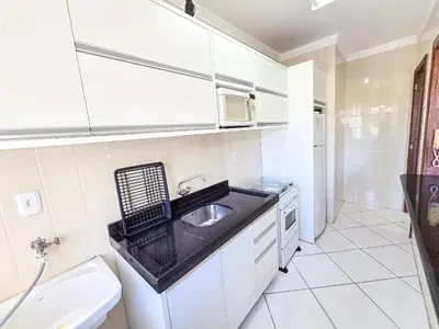 A cozinha ou kitchenette de 112 - Apto com 2 quartos a poucos passos do mar!