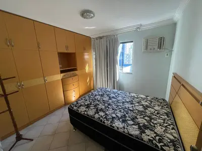 Uma cama ou camas num quarto em Apartamento amplo e completo a menos de 100m da praia Meia Praia, Itapema SC