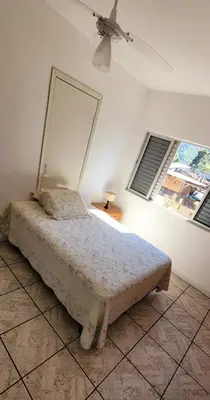 Uma cama ou camas num quarto em Casa Ensolarada