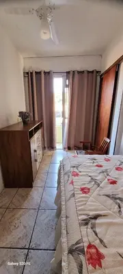 Uma cama ou camas num quarto em Casa Ensolarada