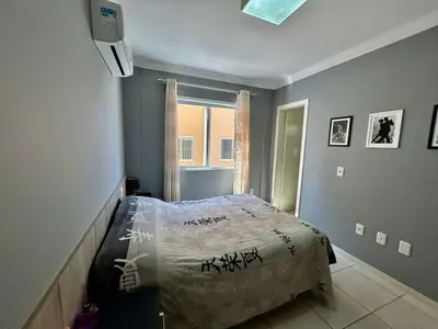 Uma cama ou camas num quarto em Apartamento 3 Quartos 300m da praia