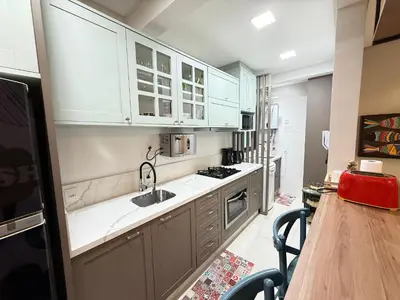A cozinha ou kitchenette de Cód 110 - Apartamento espetacular à 280m do mar