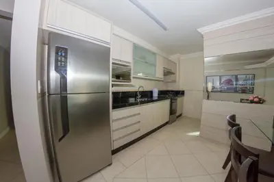 A cozinha ou kitchenette de Apartamentos em Bombinhas