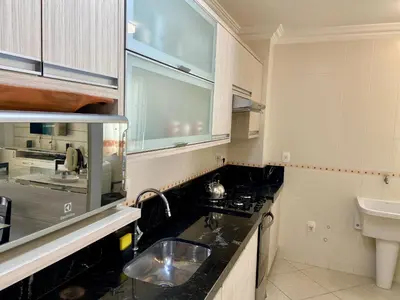 A cozinha ou kitchenette de Apartamentos em Bombinhas