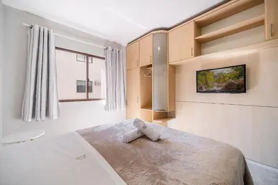 Uma cama ou camas num quarto em Achei Itapema • Nápoli Residencial, R.224