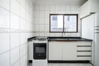 A cozinha ou kitchenette de Achei Itapema • Nápoli Residencial, R.224