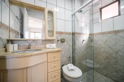 Uma casa de banho em Achei Itapema • Nápoli Residencial, R.224