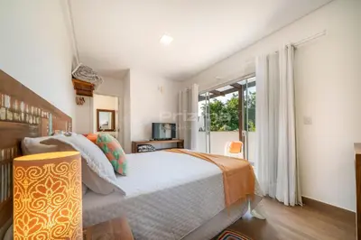 Uma cama ou camas num quarto em Flat em Residencial - Entre Bombinhas e 4 Ilhas