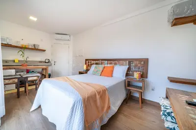 Uma cama ou camas num quarto em Flat em Residencial - Entre Bombinhas e 4 Ilhas