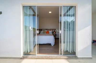 Uma cama ou camas num quarto em Flat em Residencial - Entre Bombinhas e 4 Ilhas