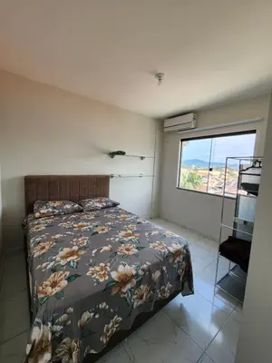 Uma cama ou camas num quarto em apartamento
