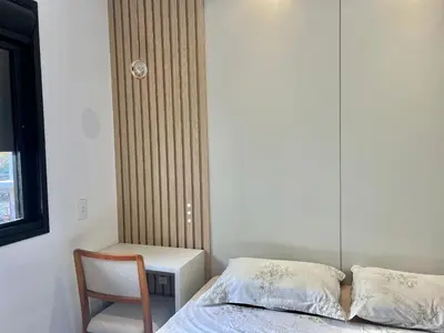 Uma cama ou camas num quarto em Apto vista MAR na praia de Palmas! ZI01I