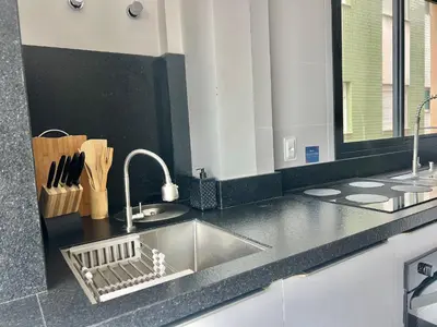 A cozinha ou kitchenette de Apto vista MAR na praia de Palmas! ZI01I