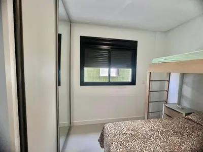 Uma cama ou camas num quarto em Apto vista MAR na praia de Palmas! ZI01I