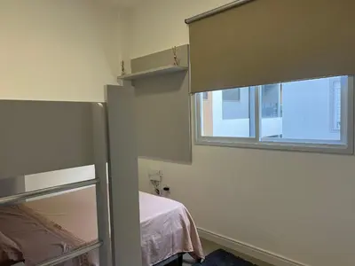 Uma cama ou camas num quarto em Lindo! Apto completo na Praia de Palmas! ZI02I