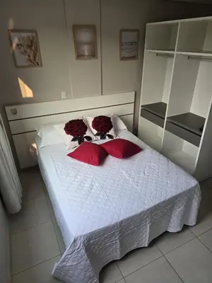 Uma cama ou camas num quarto em Residencial Flórida I