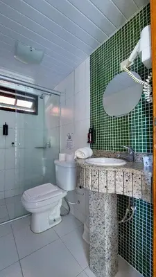 Uma casa de banho em Pousada Palmeiras Bombinhas