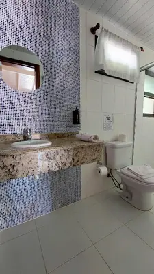 Uma casa de banho em Pousada Palmeiras Bombinhas