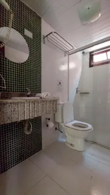 Uma casa de banho em Pousada Palmeiras Bombinhas