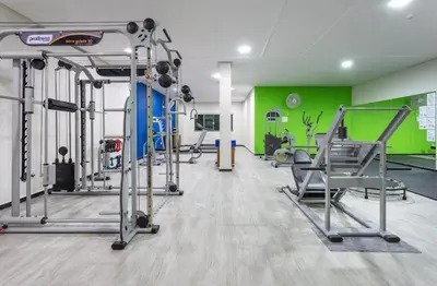 O centro de fitness e/ou as comodidades de fitness de Apartamento em Bombinhas