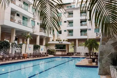 A piscina em ou perto de Apartamento em Bombinhas