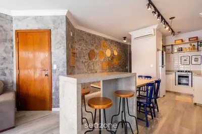 A cozinha ou kitchenette de Apto c/ varanda e churrasq. a 30m do Mar RDM0101