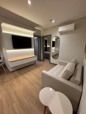 Uma área de estar em Flats New York Meia Praia Itapema