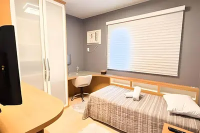 Uma cama ou camas num quarto em ASA | Apto Vale Dourado | Frente-Mar | Hidro |2VGS