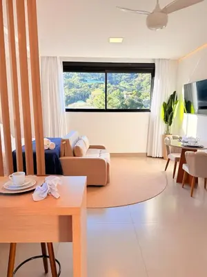 Uma televisão e/ou sistema de entretenimento em Studio Luxo • Serra BC & Itapema