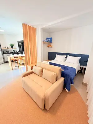 Uma cama ou camas num quarto em Studio Luxo • Serra BC & Itapema