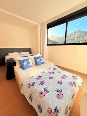 Uma cama ou camas num quarto em Studio Luxo • Serra BC & Itapema
