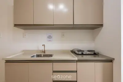 A cozinha ou kitchenette de Apartamentos a 400m da Praia em Itapema - CARA