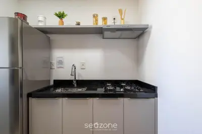 A cozinha ou kitchenette de Apartamentos a 400m da Praia em Itapema - CARA