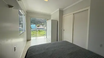 Uma cama ou camas num quarto em Casa Paraíso do Canário