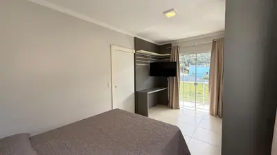 Uma cama ou camas num quarto em Casa Paraíso do Canário