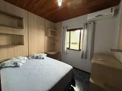 Uma cama ou camas num quarto em Casa a 150M da praia, Self Check-in