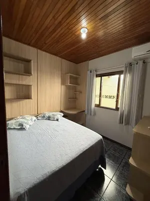 Uma cama ou camas num quarto em Casa a 150M da praia, Self Check-in