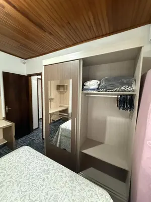Uma cama ou camas num quarto em Casa a 150M da praia, Self Check-in