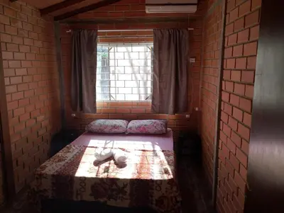 Uma cama ou camas num quarto em Kitnet 2 quartos Porto Belo, perto da praia