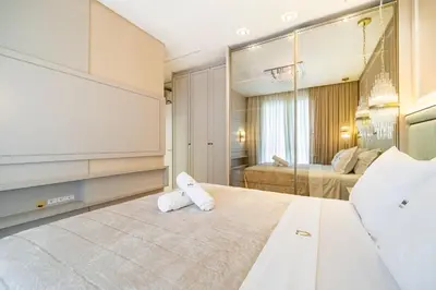 Uma cama ou camas num quarto em Achei Itapema • Sunwell Palace Residencial, R.323