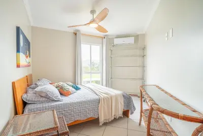 Uma cama ou camas num quarto em Apto 03 quartos | Canto Grande