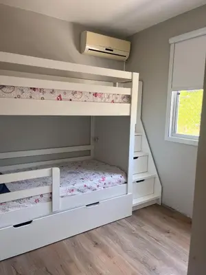 Uma cama ou camas num quarto em Aroeira Ap