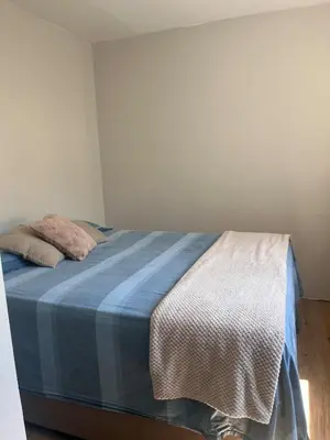 Uma cama ou camas num quarto em Aroeira Ap