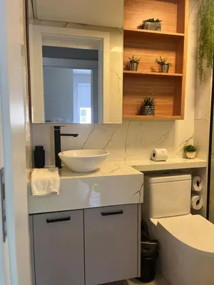 Uma casa de banho em Aroeira Ap