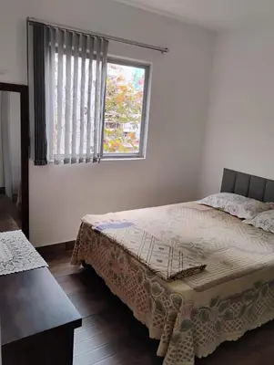 Uma cama ou camas num quarto em Apartment in Itapema Beach